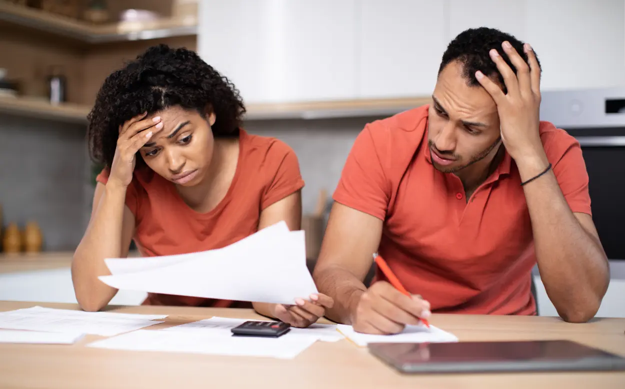 Stressed couple examining finances in a home kitch 2026 03 24 14 13 18 utc